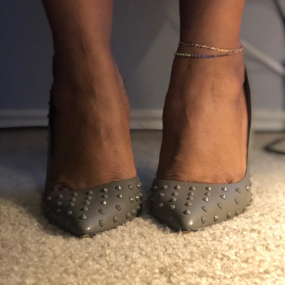 Spike high heel shoes